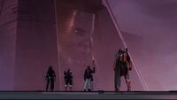 Rohan standing next to a fireteam of Guardians in front of the Typhon Imperator.